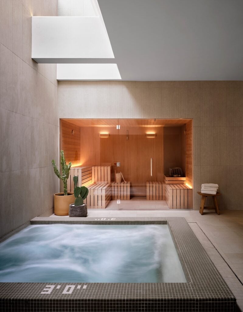 Cedar-lined sauna and mosaic-tiled plunge pool with skylight in the spa at Mii amo, Sedona
