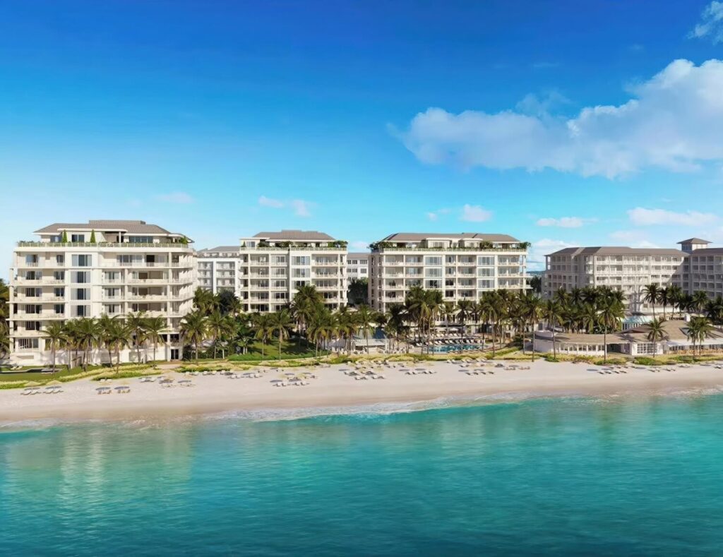 Aerial render of resort buildings and beach from the Gulf at Naples Beach Club, A Four Seasons Resort, Naples Florida