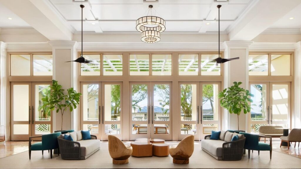 Grand lobby with capiz chandelier and contemporary seating at Hyatt Regency Coconut Point Resort & Spa, Bonita Springs, Florida.