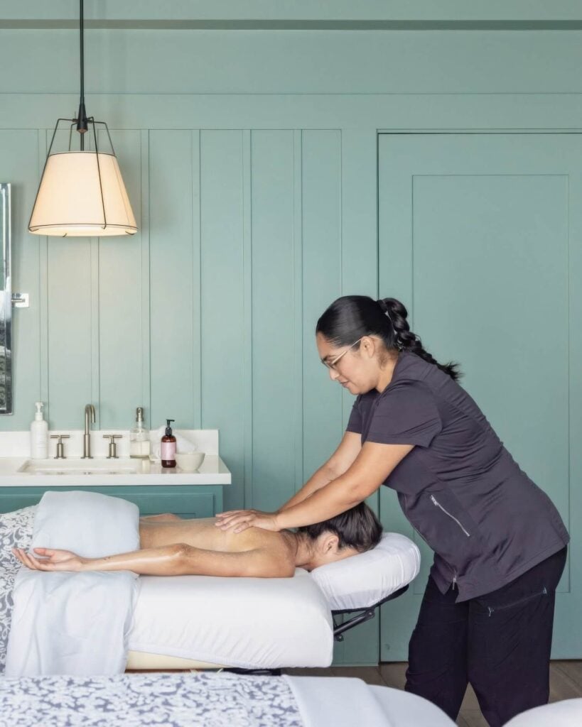 Massage in a sage-green treatment suite at the Spa at Carneros, Carneros Resort and Spa, Napa, California