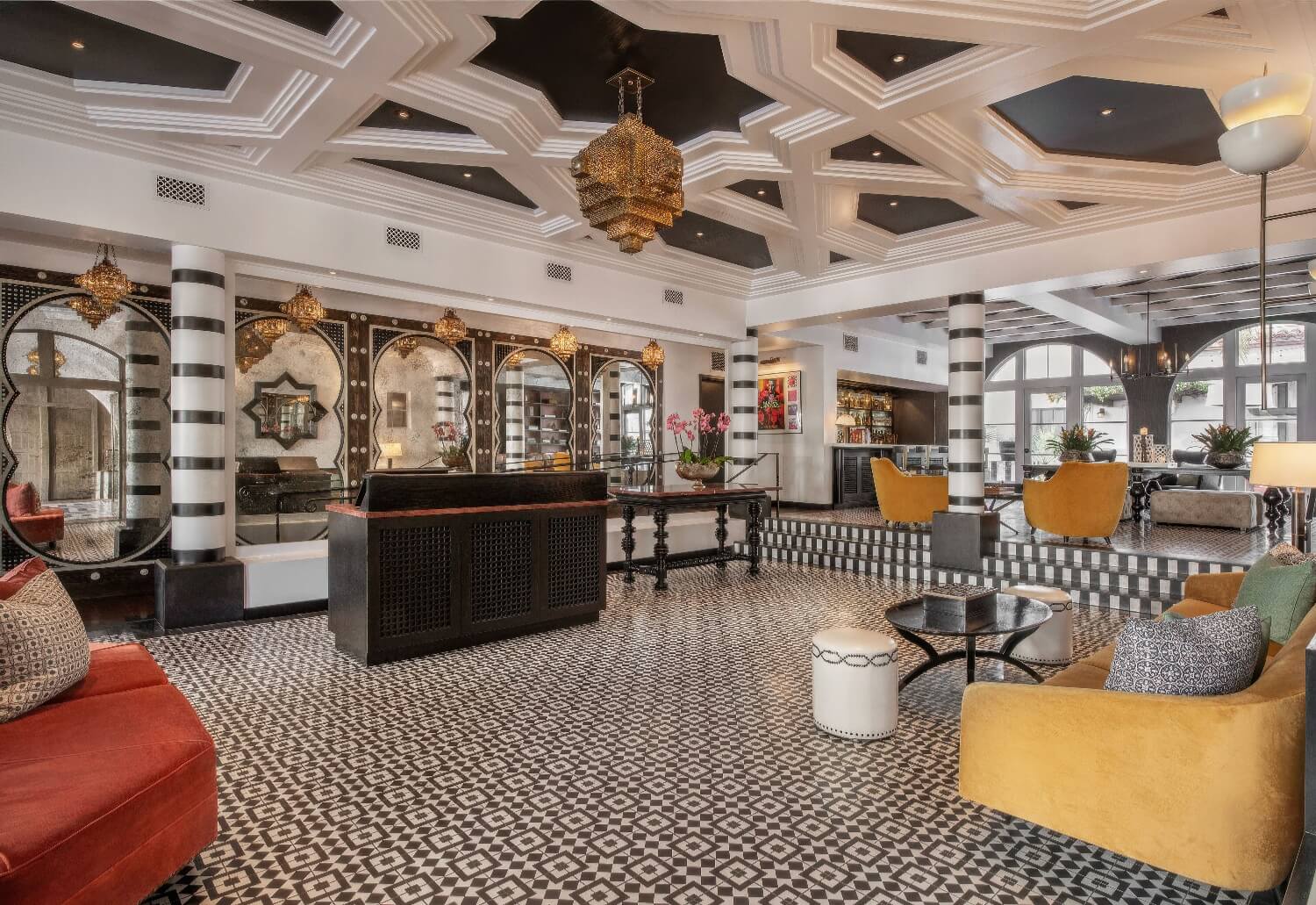 Moorish lobby with a coffered ceiling, brass lanterns, arched mirrors and mosaic floor at Hotel Californian, Santa Barbara
