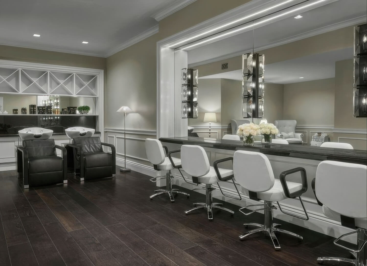 Sense Spa salon with white styling chairs, mirrored walls and leather wash stations at Rosewood Miramar Beach, Montecito